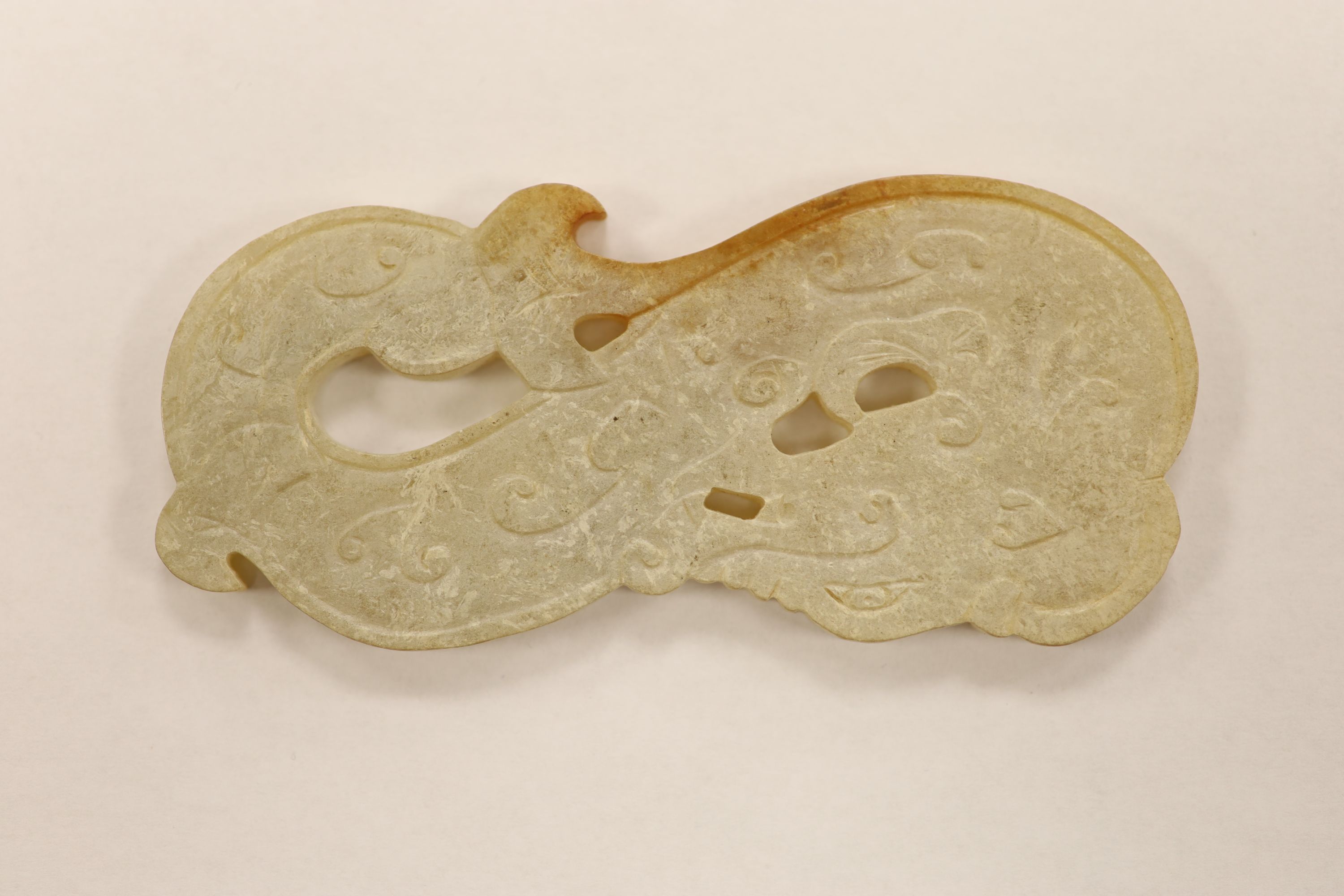 A quantity of assorted jade bi discs and other hardstones